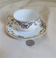 Antique Haviland Limoges porcelain teacup and saucer set with cobalt blue scroll pattern Antique Haviland Limoges porcelain teacup and saucer set with cobalt blue scroll pattern