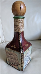 Vintage Italian leather wrapped green glass decanter with hand painted sailing ships and wooden stopper Vintage Italian leather wrapped green glass decanter with hand painted sailing ships and wooden stopper